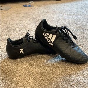 Black adidas soccer cleats